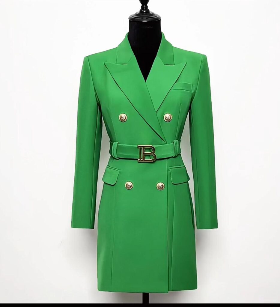 Green double-breasted blazer dress with gold buttons and matching belt.